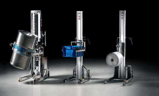 Three lifting devices are shown on a dark background. Each holds a different object: a metal drum, a blue crate, and a large roll of material.